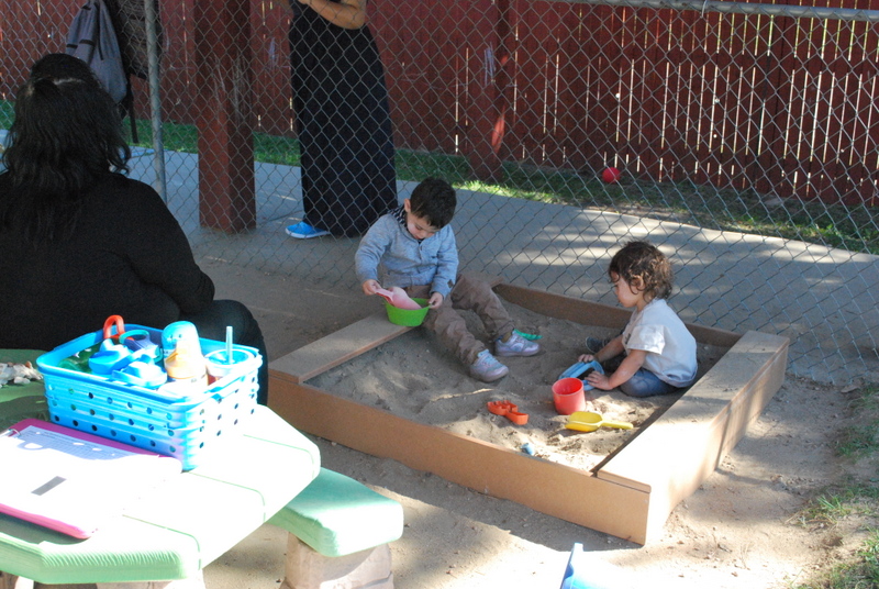 kids playing in the sand box